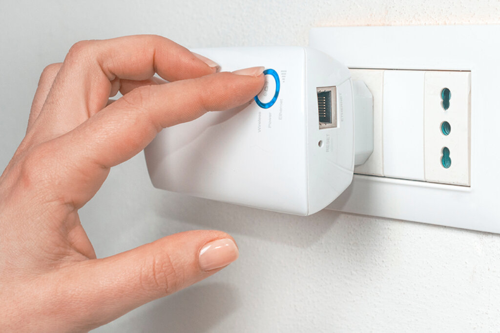 Para ihop en powerline-adapter via WPS-funktionsknappen